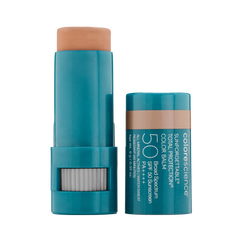 Two sunscreen sticks with blue packaging on a white background