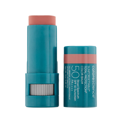 A stick of Sunforgettable Total Protection Color Balm SPF 50 with the cap off, showing the balm stick with a raspberry color shade.