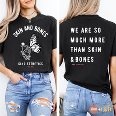 Black t-shirt with 'Skin and Bones' design and text on front and back, worn by a person.