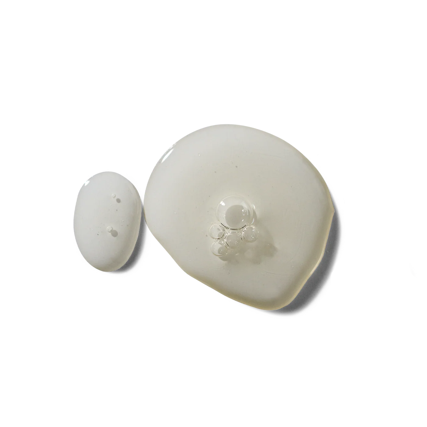 Two white ceramic items on a white background
