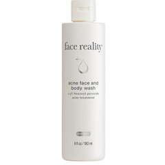A bottle of Face Reality Acne Face and Body Wash with 1.5% benzoyl peroxide.