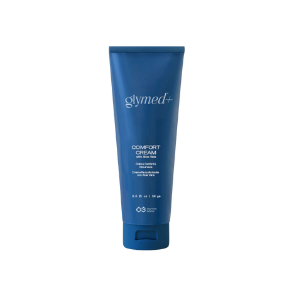 A blue tube of Glymed+ Comfort Cream, with product information and branding visible.
