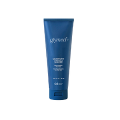 A blue tube of Glymed+ Comfort Cream, with product information and branding visible.