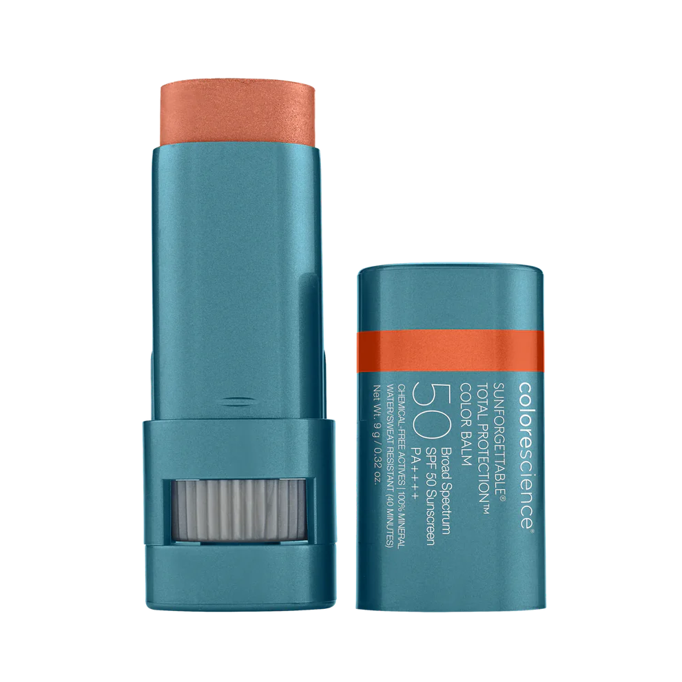 A stick of Sunforgettable Total Protection Color Balm SPF 50 with the cap off, showing the balm stick with a raspberry color shade.