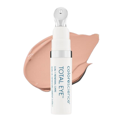 A pump bottle of Total Eye 3-in-1 Renewal Therapy SPF 35 with a swatch of the beige-colored cream next to it.